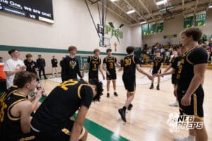 Gretna East starter Lucas Wintenborer (30) is welcomed to the court by teammates before a high school basketball game Thursday, December 11, 2025, in Lincoln, Nebraska. Photo by Braden Cochran.