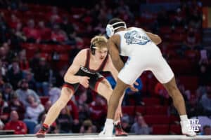 Nebraska Cornhusker Scott Robertson wrestles against North Carolina Tar Heel Nate Askew during a college wrestling duel at 149 on Friday, Dec 19, 2025, in Lincoln, Nebraska.
