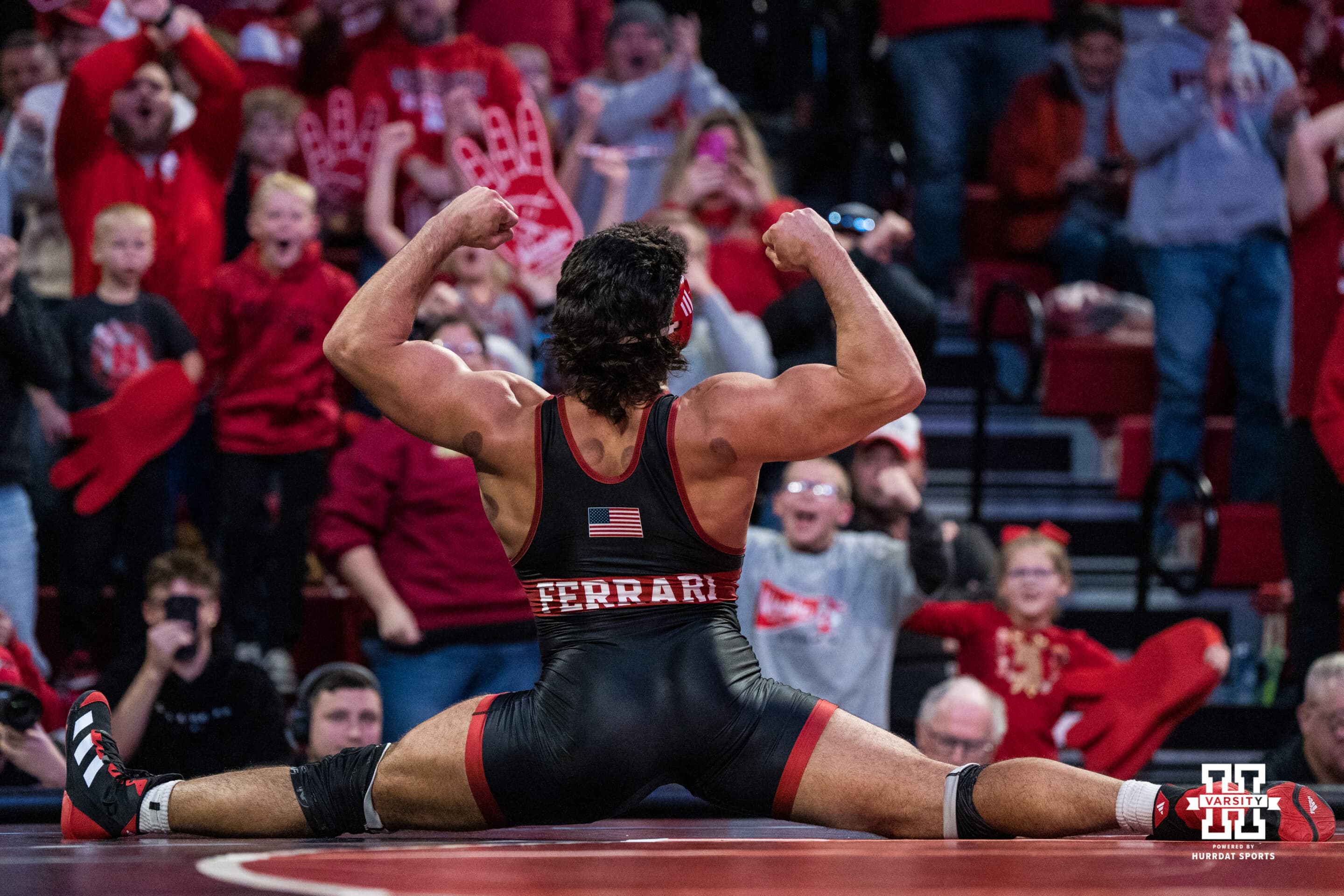 Nebraska Cornhusker AJ Ferrari celebrates beating North Carolina Tar Heel Mikey Calcagno during a college wrestling duel on Friday, Dec 19, 2025, in Lincoln, Nebraska.
