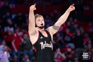 Nebraska Cornhusker Camden McDanel celebrates a win against North Carolina Tar Heel Robert Platt after a college wrestling duel on Friday, Dec 19, 2025, in Lincoln, Nebraska.