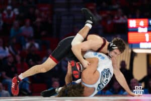 Nebraska Cornhusker LJ Araujo wrestles against North Carolina Tar Heel Bryce Hepner during a college wrestling duel at 165 on Friday, Dec 19, 2025, in Lincoln, Nebraska.