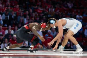 Nebraska Cornhusker Antrell Taylor wrestles against North Carolina Tar Heel Laird Root during a college wrestling duel at 157 on Friday, Dec 19, 2025, in Lincoln, Nebraska.