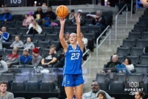 Creighton Bluejay Neleigh Gessert (23) shoots a three pointer during a basketball game against Omaha on Wednesday, Dec 17, 2025, in Omaha, Nebraska. Photo by Brandon Tiedemann.