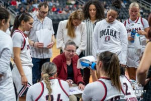 Omaha Maverick head coach Jamie Carey talks during a timeout during a basketball game against Creighton on Wednesday, Dec 17, 2025, in Omaha, Nebraska. Photo by Brandon Tiedemann.