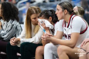 Omaha Maverick Sarai Estupiñan (5) sits upset on the bench during a basketball game against Creighton on Wednesday, Dec 17, 2025, in Omaha, Nebraska. Photo by Brandon Tiedemann.