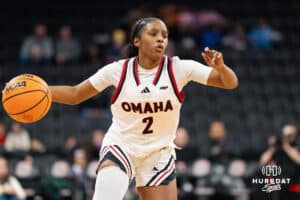 Omaha Maverick Leekaya Burke Perryman (2) dribbles during a basketball game against Creighton on Wednesday, Dec 17, 2025, in Omaha, Nebraska. Photo by Brandon Tiedemann.