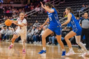 Omaha Maverick Sarai Estupiñan (5) drives to the basket during a basketball game against Creighton on Wednesday, Dec 17, 2025, in Omaha, Nebraska. Photo by Brandon Tiedemann.