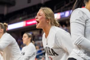 Omaha Maverick Cora Olsen (22) cheers during a basketball game against Creighton on Wednesday, Dec 17, 2025, in Omaha, Nebraska. Photo by Brandon Tiedemann.
