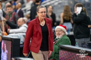 Omaha Maverick head coach Jamie Carey walks to the bench before a basketball game against Creighton on Wednesday, Dec 17, 2025, in Omaha, Nebraska. Photo by Brandon Tiedemann.