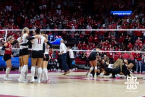 Texas A&M Aggies celebrate the win over the Nebraska Cornhuskers in the fifth set during the NCAA Volleyball Regional on Sunday, Dec. 14, 2025, in Lincoln, Nebraska. Photo by John S. Peterson.
