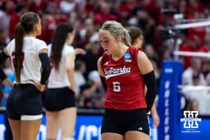 Nebraska Cornhusker libero/defensive specialist Laney Choboy (6) walks back to serve against the Texas A&M Aggies in the fifth set during the NCAA Volleyball Regional on Sunday, Dec. 14, 2025, in Lincoln, Nebraska. Photo by John S. Peterson.