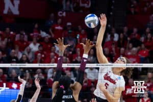 Nebraska Cornhusker middle blocker Rebekah Allick (5) spikes the ball against the Texas A&M Aggies in the fifth set during the NCAA Volleyball Regional on Sunday, Dec. 14, 2025, in Lincoln, Nebraska. Photo by John S. Peterson.
