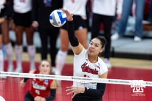 Nebraska Cornhusker outside hitter Teraya Sigler (11) spikes the ball against the Texas A&M Aggies in the fourth set during the NCAA Volleyball Regional on Sunday, Dec. 14, 2025, in Lincoln, Nebraska. Photo by John S. Peterson.