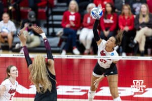 Nebraska Cornhusker outside hitter Harper Murray (27) spikes the ball against the Texas A&M Aggies in the third set during the NCAA Volleyball Regional on Sunday, Dec. 14, 2025, in Lincoln, Nebraska. Photo by John S. Peterson.
