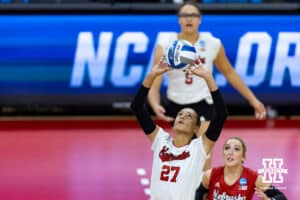 Nebraska Cornhusker outside hitter Harper Murray (27) sets the ball against the Texas A&M Aggies in the second set during the NCAA Volleyball Regional on Sunday, Dec. 14, 2025, in Lincoln, Nebraska. Photo by John S. Peterson.