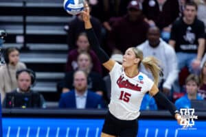 Nebraska Cornhusker middle blocker Andi Jackson (15) bumps the ball against the Texas A&M Aggies in the second set during the NCAA Volleyball Regional on Sunday, Dec. 14, 2025, in Lincoln, Nebraska. Photo by John S. Peterson.