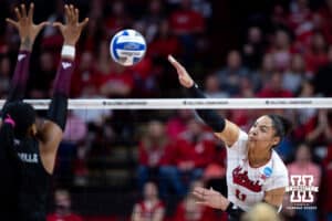 Nebraska Cornhusker outside hitter Teraya Sigler (11) spikes the ball against the Texas A&M Aggies in the second set during the NCAA Volleyball Regional on Sunday, Dec. 14, 2025, in Lincoln, Nebraska. Photo by John S. Peterson.