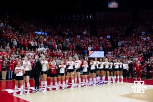Nebraska Cornhuskers lines up for the National Anthem before taking on the Texas A&M Aggies during the NCAA Volleyball Regional on Sunday, Dec. 14, 2025, in Lincoln, Nebraska. Photo by John S. Peterson.