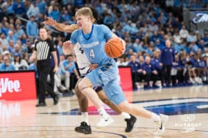 Creighton Bluejay Josh Dix (4) drives to the hoop during a basketball game against Kansas State on Saturday, Dec 13, 2025, in Omaha, Nebraska. Photo by Brandon Tiedemann.