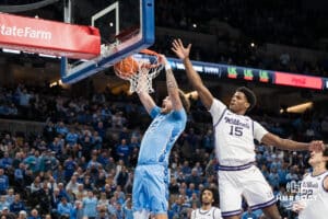 Creighton Bluejay Owen Freeman (32) dunks during a basketball game against Kansas State on Saturday, Dec 13, 2025, in Omaha, Nebraska. Photo by Brandon Tiedemann.