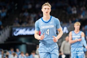 Creighton Bluejay Josh Dix (4) runs down the court during a basketball game against Kansas State on Saturday, Dec 13, 2025, in Omaha, Nebraska. Photo by Brandon Tiedemann.
