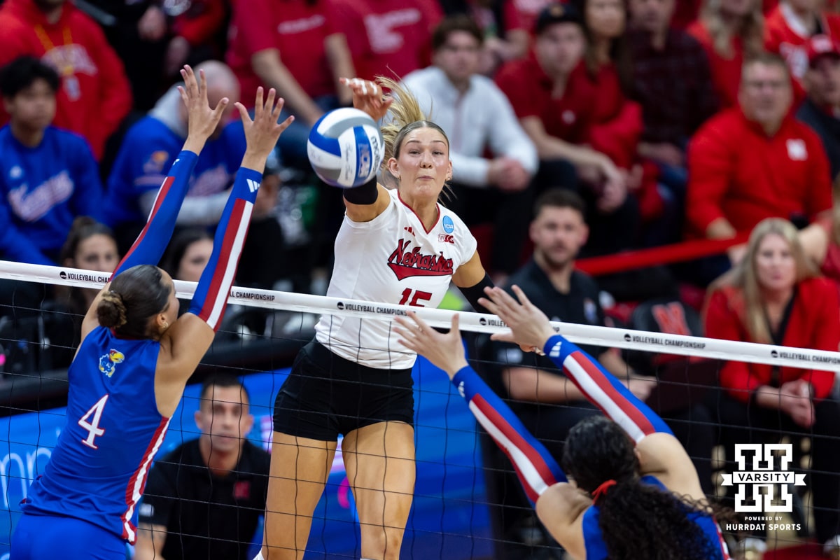 Nebraska Cornhusker middle blocker Andi Jackson (15) spikes the ball for a kill against the Kansas Jayhawks in the second set during the NCAA volleyball championship sweet sixteen match on Friday, Dec. 12, 2025, in Lincoln, Nebraska. Photo by John S. Peterson.
