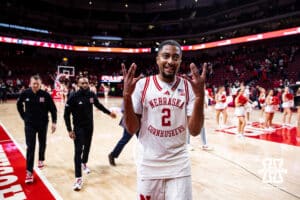 Nebraska Cornhusker guard Kendall Blue (2) holds up a copule W's after the win over the Wisconsin Badgers during a college men’s basketball game on Wednesday, Dec. 10, 2025, in Lincoln, Nebraska. Photo by John S. Peterson.