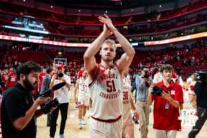 Nebraska Cornhusker forward Rienk Mast (51) claps for the fans after the win over the Wisconsin Badgers during a college men’s basketball game on Wednesday, Dec. 10, 2025, in Lincoln, Nebraska. Photo by John S. Peterson.