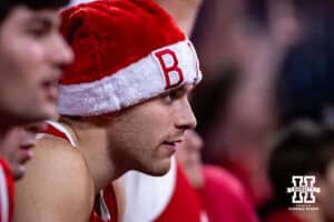 Nebraska Cornhusker fans watches the game against the Wisconsin Badgers intensely during a college men’s basketball game on Wednesday, Dec. 10, 2025, in Lincoln, Nebraska. Photo by John S. Peterson.
