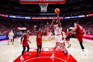Nebraska Cornhusker guard Sam Hoiberg (1) makes a lay up against the Wisconsin Badgers in the second half during a college men’s basketball game on Wednesday, Dec. 10, 2025, in Lincoln, Nebraska. Photo by John S. Peterson.