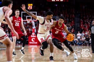 Nebraska Cornhusker guard Jamarques Lawrence (10) defends against Wisconsin Badger guard Nick Boyd (2) in the second half during a college men’s basketball game on Wednesday, Dec. 10, 2025, in Lincoln, Nebraska. Photo by John S. Peterson.