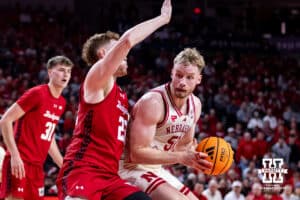 Nebraska Cornhusker forward Rienk Mast (51) drives to the basket against Wisconsin Badger forward Austin Rapp (22) in the first half during a college men’s basketball game on Wednesday, Dec. 10, 2025, in Lincoln, Nebraska. Photo by John S. Peterson.