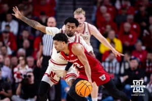 Nebraska Cornhusker guard Jamarques Lawrence (10) guards against Wisconsin Badger guard Nick Boyd (2) in the first half during a college men’s basketball game on Wednesday, Dec. 10, 2025, in Lincoln, Nebraska. Photo by John S. Peterson.