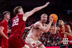 Nebraska Cornhusker forward Rienk Mast (51) goes for a shot against Wisconsin Badger forward Austin Rapp (22) in the first half during a college men’s basketball game on Wednesday, Dec. 10, 2025, in Lincoln, Nebraska. Photo by John S. Peterson.