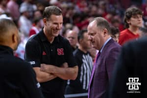 Nebraska Cornhusker head coach Fred Hoiberg talks to Wisconsin Badger head coach Greg Gard before a college men’s basketball game on Wednesday, Dec. 10, 2025, in Lincoln, Nebraska. Photo by John S. Peterson.