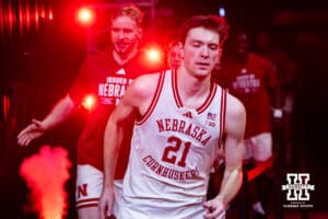 Nebraska Cornhusker forward Pryce Sandfort (21) lead the Huskers out to the court to take on the Wisconsin Badgers during a college men’s basketball game on Wednesday, Dec. 10, 2025, in Lincoln, Nebraska. Photo by John S. Peterson.