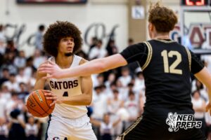 Lincoln North Star guard Jakeyce Fowler (4) looks to move the ball around Lincoln Southeast’s Grant Fredricks (12) during a high school basketball game Friday, December 5, 2025, in Lincoln, Nebraska. Photo by Braden Cochran.