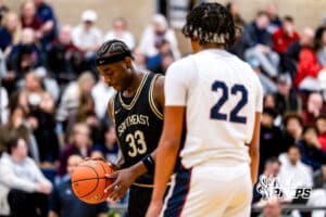 Lincoln Southeast’s Prospedi Mukendi (33) prepares for a freethrow while North Star guard Jordan Castor (22) waits for the shot during a high school basketball game on Friday, December 5, 2025, in Lincoln, Nebraska. Photo by Braden Cochran.