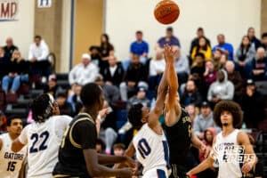 Lincoln North Star guard J'Shawn Afuh (1) goes for the rebound against Lincoln Southeast guard Jayvis Johnson (5) during a high school basketball game on Friday December 5, 2025, in Lincoln, Nebraska. Photo by Braden Cochran.