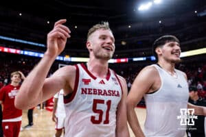 Nebraska Cornhusker forward Rienk Mast (51) and forward Berke Buyuktuncel (9) celebrates the win over the Creighton Bluejays during a college basketball game on Sunday, Dec. 7, 2025, in Lincoln, Nebraska. Photo by John S. Peterson.