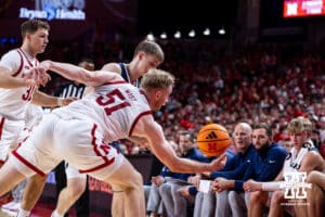 Nebraska Cornhusker forward Rienk Mast (51) steals the ball away from Creighton Bluejay guard Josh Dix (4) in the second half during a college basketball game on Sunday, Dec. 7, 2025, in Lincoln, Nebraska. Photo by John S. Peterson.