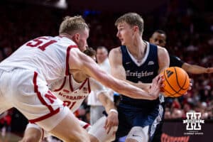 Nebraska Cornhusker forward Rienk Mast (51) steals the ball away from Creighton Bluejay guard Josh Dix (4) in the second half during a college basketball game on Sunday, Dec. 7, 2025, in Lincoln, Nebraska. Photo by John S. Peterson.