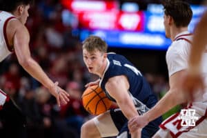 Creighton Bluejay guard Josh Dix (4) dribbles the ball against the Nebraska Cornhuskers in the second half during a college basketball game on Sunday, Dec. 7, 2025, in Lincoln, Nebraska. Photo by John S. Peterson.
