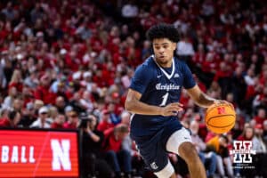 Creighton Bluejay guard Austin Swartz (1) dribbles to the basket against the Nebraska Cornhuskers in the second half during a college basketball game on Sunday, Dec. 7, 2025, in Lincoln, Nebraska. Photo by John S. Peterson.