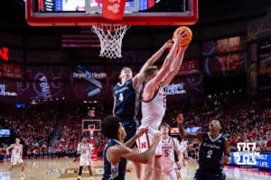 Nebraska Cornhusker forward Rienk Mast (51) grabs the rebound against Creighton Bluejay guard Josh Dix (4) in the first half during a college basketball game on Sunday, Dec. 7, 2025, in Lincoln, Nebraska. Photo by John S. Peterson.