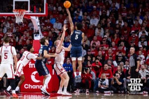 Creighton Bluejay guard Nik Graves (5) makes basket against the Nebraska Cornhuskers in the first half during a college basketball game on Sunday, Dec. 7, 2025, in Lincoln, Nebraska. Photo by John S. Peterson.