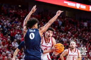 Nebraska Cornhusker forward Berke Buyuktuncel (9) drives to the basket against Creighton Bluejay forward Jasen Green (0) in the first half during a college basketball game on Sunday, Dec. 7, 2025, in Lincoln, Nebraska. Photo by John S. Peterson.