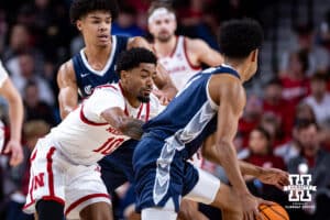 Nebraska Cornhusker guard Jamarques Lawrence (10) guarding Creighton Bluejay guard Nik Graves (5) in the first half during a college basketball game on Sunday, Dec. 7, 2025, in Lincoln, Nebraska. Photo by John S. Peterson.