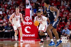 Nebraska Cornhusker guard Jamarques Lawrence (10) dribbles the ball down the court against Creighton Bluejay guard Blake Harper (2) in the first half during a college basketball game on Sunday, Dec. 7, 2025, in Lincoln, Nebraska. Photo by John S. Peterson.