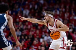 Nebraska Cornhusker guard Sam Hoiberg (1) signals to his teammates against the Creighton Bluejays in the first half during a college basketball game on Sunday, Dec. 7, 2025, in Lincoln, Nebraska. Photo by John S. Peterson.